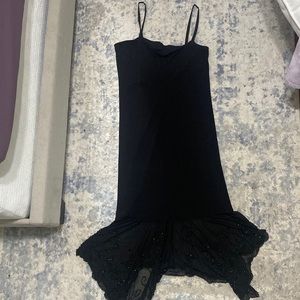 Onyx Nite dress. Hand beaded on lace at the bottom.